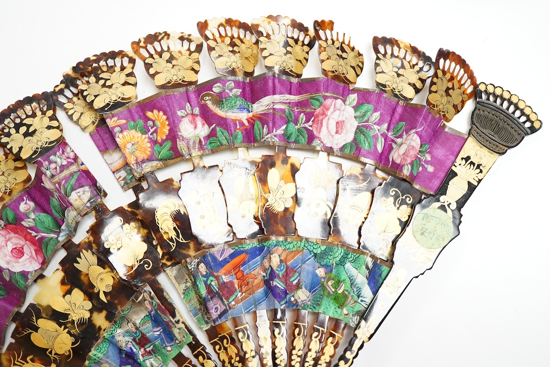 An unusual 19th century Chinese export gilt-decorated tortoiseshell and painted leaf fan, two English fans decorated with paper printed paper crests and a single sided Canton fan leaf lacking sticks, largest 23cm in leng